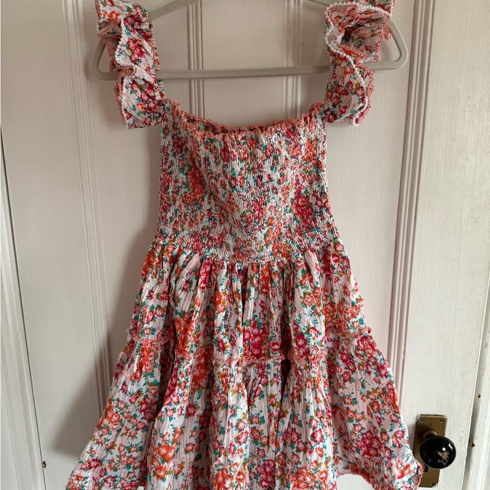 Smocked mini dress with tiered skirt